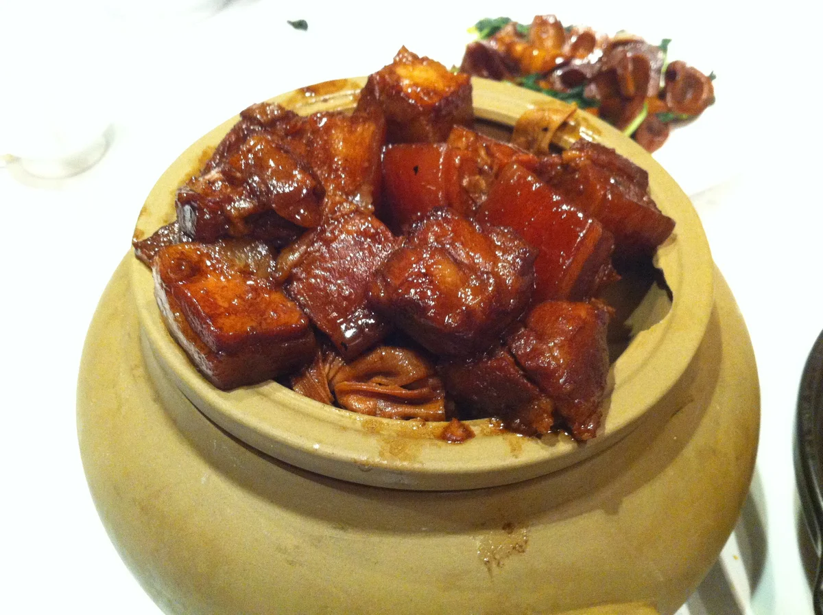 Red-braised pork belly pieces in glossy soy-sugar sauce
