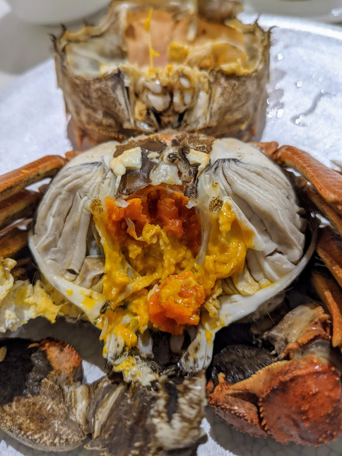 Steamed female hairy crab roe used in seasonal Shanghai crab dishes