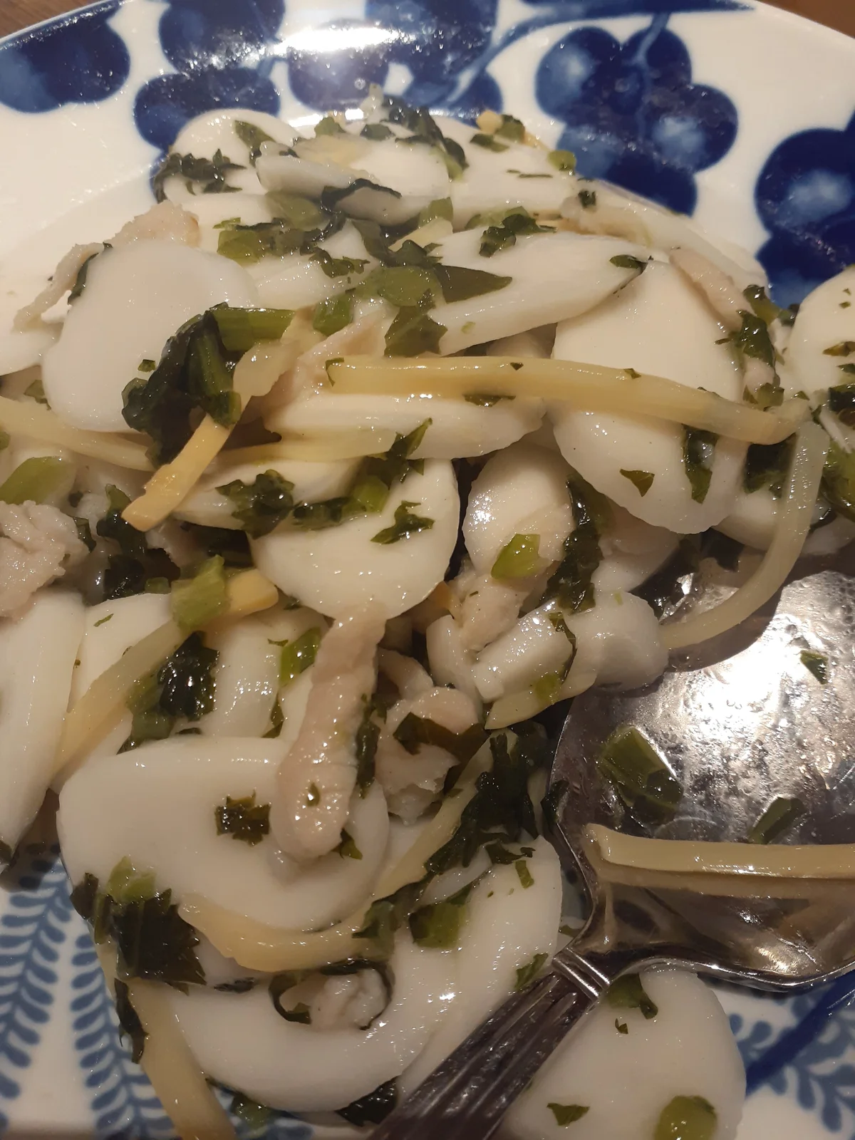 Shanghai fried rice cakes served in a restaurant-style plate