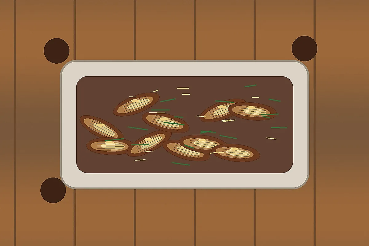 Fried fish slices soaking in dark sweet soy sauce for Shanghai xun yu
